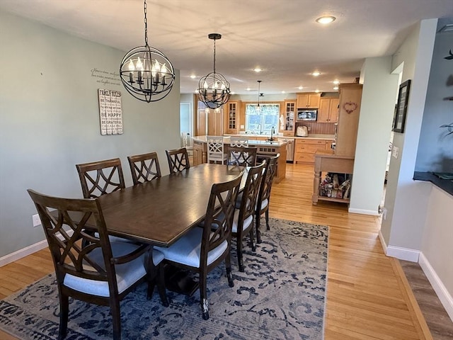 74 Fiske Hill Rd, Sturbridge, MA 01566 - dining area featuring a chandelier, light wood finished floors, baseboards, and recessed lighting