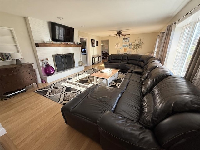 74 Fiske Hill Rd, Sturbridge, MA 01566 - living room with ceiling fan, wood finished floors, and a fireplace