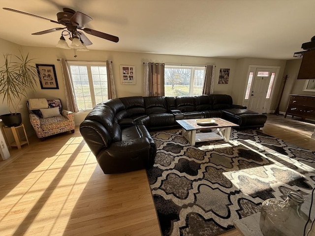 74 Fiske Hill Rd, Sturbridge, MA 01566 - living area with wood finished floors, plenty of natural light, and a ceiling fan