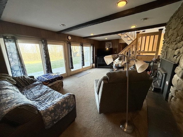 74 Fiske Hill Rd, Sturbridge, MA 01566 - living room with light colored carpet, stairway, beamed ceiling, and a fireplace