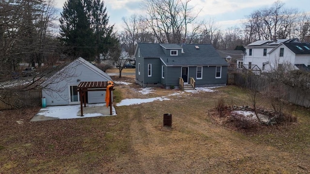 back of house featuring a patio area and a yard