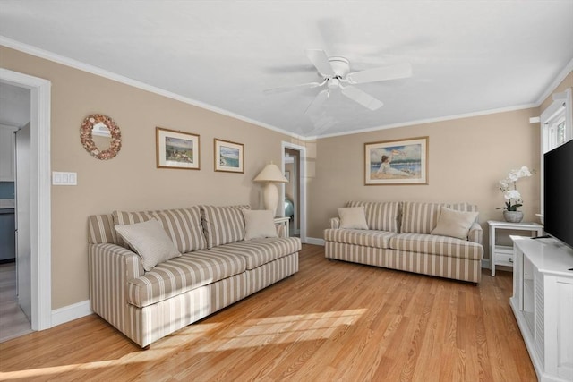 56 Baxter Ave, Yarmouth, MA 02673 - living area with baseboards, light wood-type flooring, ornamental molding, and a ceiling fan
