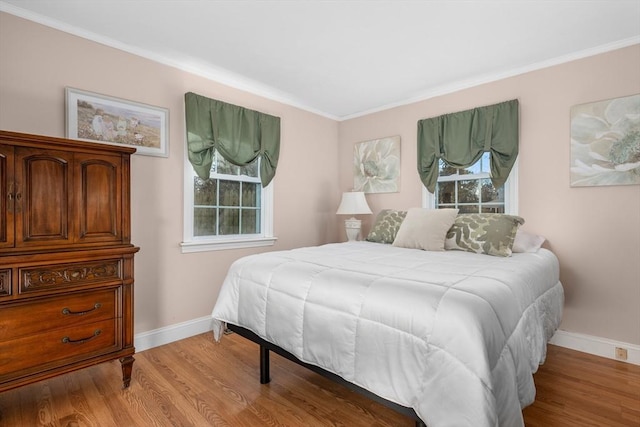56 Baxter Ave, Yarmouth, MA 02673 - bedroom featuring baseboards, ornamental molding, and wood finished floors