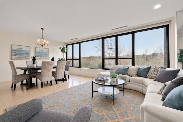 living room featuring an inviting chandelier