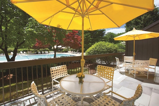 view of patio with a community pool