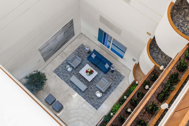 living room with a towering ceiling