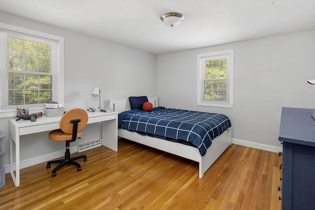 62 Bianca Rd, Duxbury, MA 02332 - bedroom with light wood-style floors, a desk, and baseboards