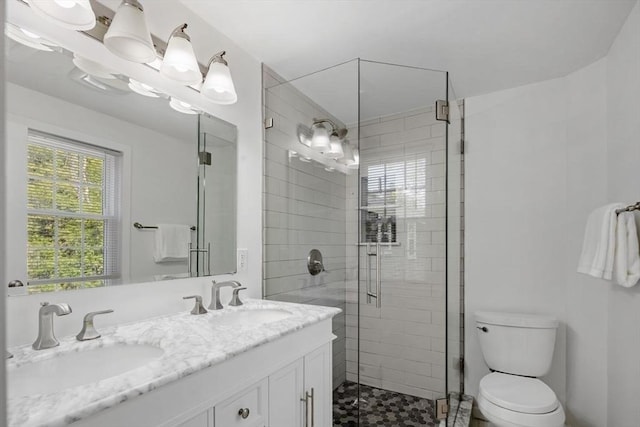 62 Bianca Rd, Duxbury, MA 02332 - full bath featuring a shower stall, toilet, double vanity, and tile patterned floors