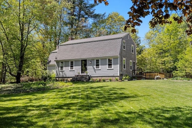 62 Bianca Rd, Duxbury, MA 02332 - colonial inspired home with a front lawn, a chimney, a gambrel roof, and a deck