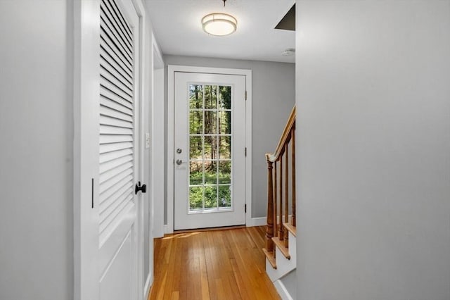 62 Bianca Rd, Duxbury, MA 02332 - doorway to outside featuring stairs, light wood finished floors, and baseboards