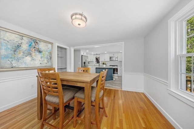 62 Bianca Rd, Duxbury, MA 02332 - dining area with light wood-style flooring and baseboards