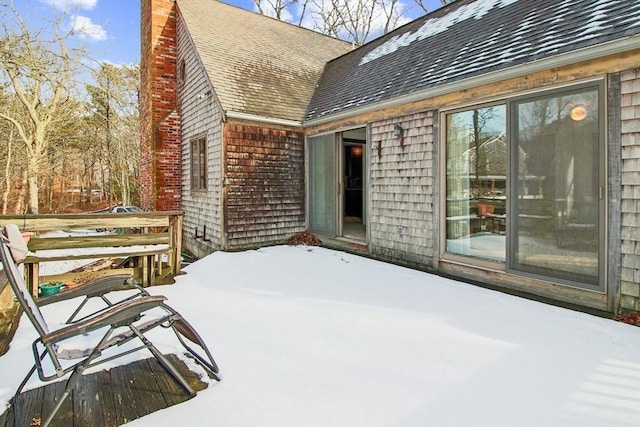 view of snow covered deck