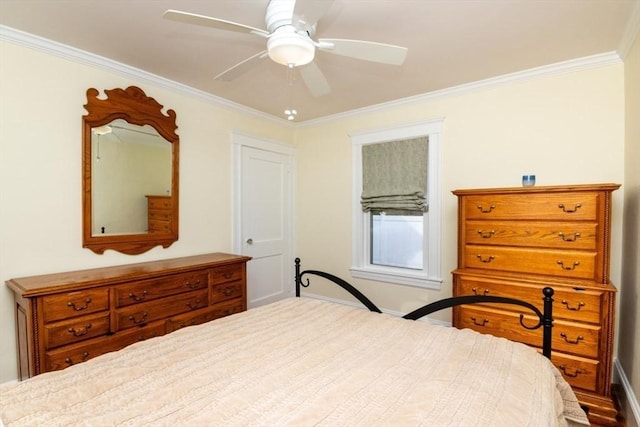 bedroom with ceiling fan and crown molding