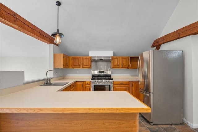 kitchen featuring stainless steel appliances, a sink, a peninsula, light countertops, and lofted ceiling