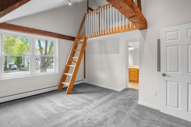 unfurnished bedroom with carpet flooring, baseboards, vaulted ceiling, and a baseboard radiator