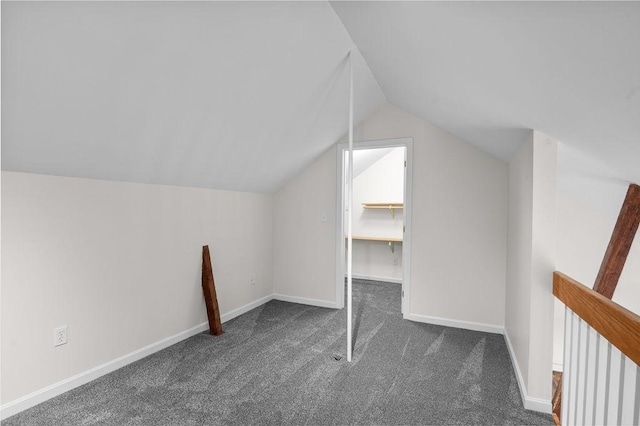 bonus room with carpet, vaulted ceiling, and baseboards