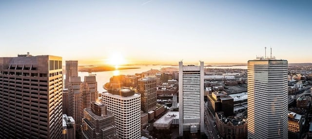 property's view of city with a water view