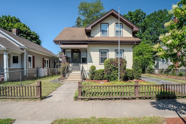 50 Duryea St, Springfield, MA 01104 - bungalow-style home with a fenced front yard and roof with shingles