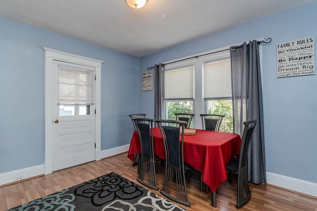 50 Duryea St, Springfield, MA 01104 - dining room featuring baseboards and plenty of natural light