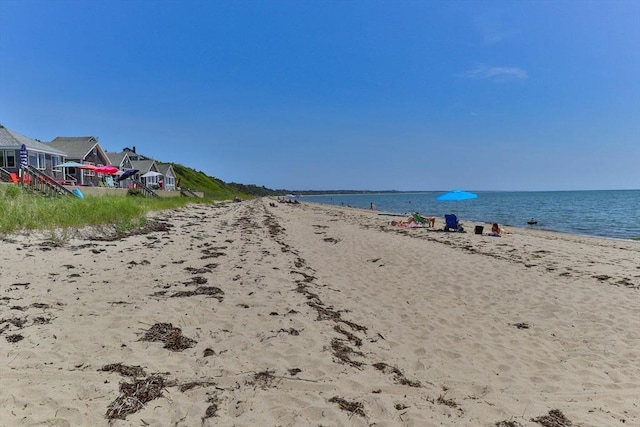 view of water feature with a beach view