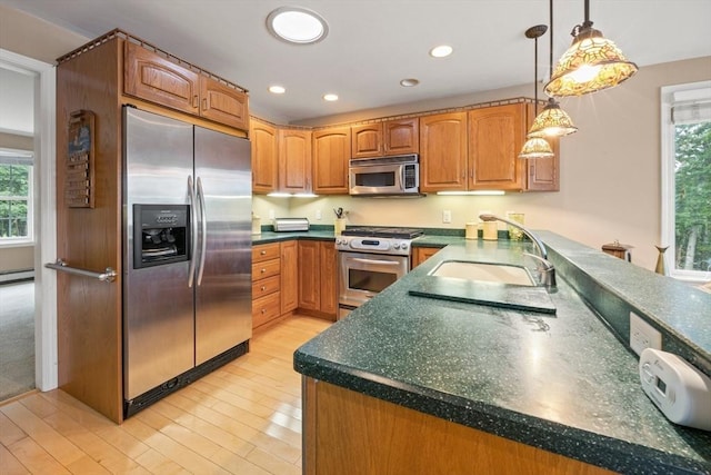 49 Edgewater Way, Wareham, MA 02571 - kitchen with light wood-style flooring, a sink, recessed lighting, stainless steel appliances, and a peninsula