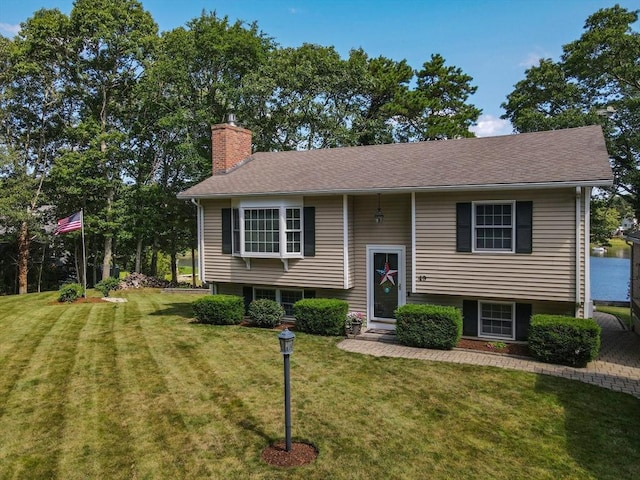49 Edgewater Way, Wareham, MA 02571 - bi-level home with a front lawn, roof with shingles, and a chimney