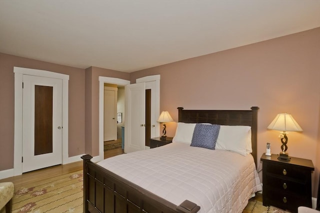 1142 Longmeadow St, Longmeadow, MA 01106 - bedroom with light wood-style flooring and baseboards