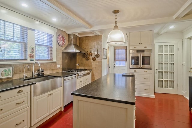 1142 Longmeadow St, Longmeadow, MA 01106 - kitchen featuring wall chimney exhaust hood, stainless steel appliances, beamed ceiling, tasteful backsplash, and a kitchen island