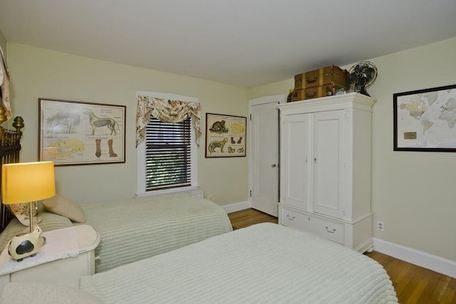 1142 Longmeadow St, Longmeadow, MA 01106 - bedroom featuring wood finished floors and baseboards