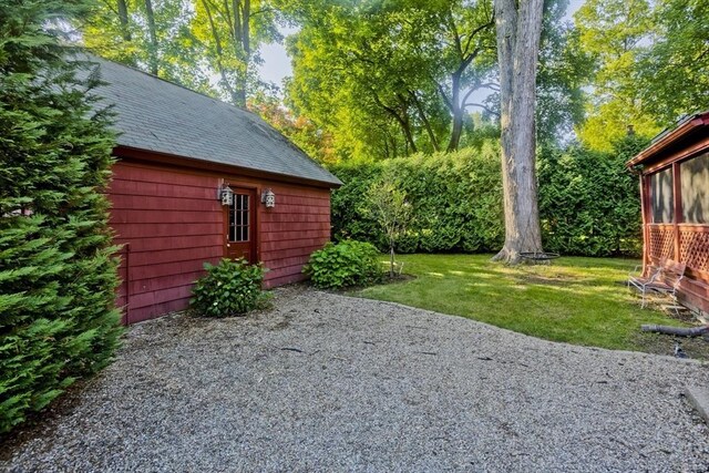 1142 Longmeadow St, Longmeadow, MA 01106 - view of green lawn with a patio
