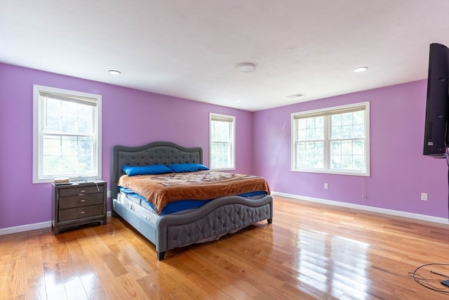 bedroom with light wood-type flooring