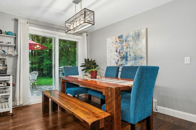 41 Dick Dr, Worcester, MA 01609 - dining space with wood finished floors, baseboards, and a chandelier