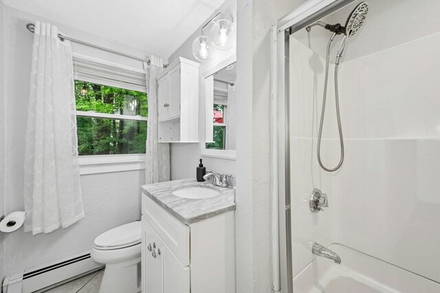 41 Dick Dr, Worcester, MA 01609 - full bathroom featuring baseboard heating, vanity, bathtub / shower combination, toilet, and tile patterned flooring