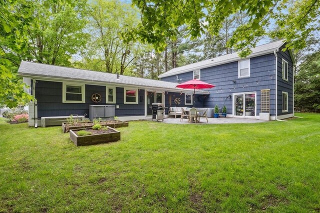 41 Dick Dr, Worcester, MA 01609 - rear view of property with a patio and a yard