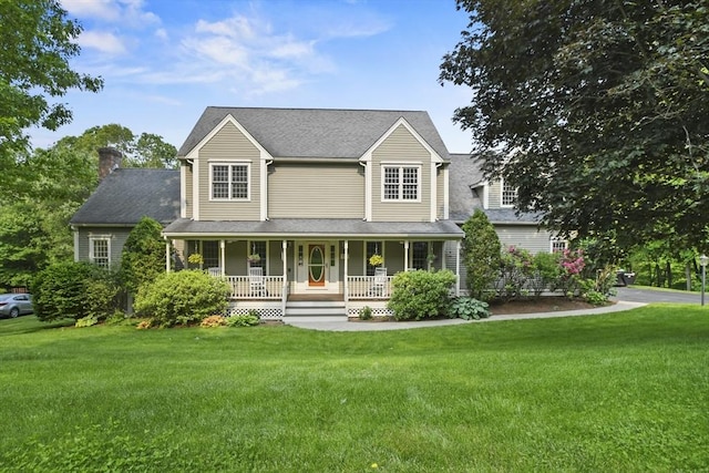 17 Sean Mikeal Way, Grafton, MA 01519 - view of front of property with a porch, a chimney, and a front yard