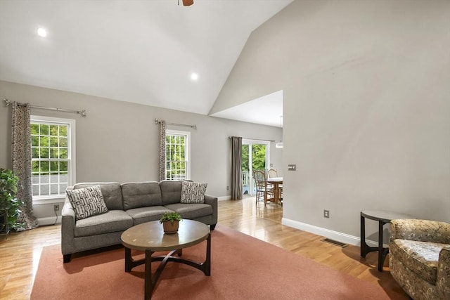 17 Sean Mikeal Way, Grafton, MA 01519 - living room with plenty of natural light, light wood-style floors, baseboards, high vaulted ceiling, and recessed lighting