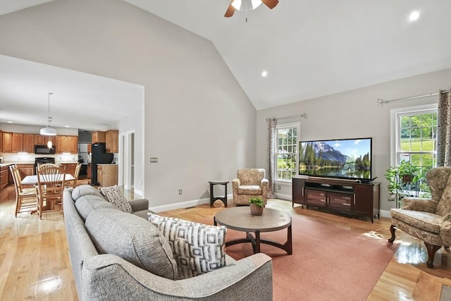 17 Sean Mikeal Way, Grafton, MA 01519 - living room with high vaulted ceiling, light wood-style flooring, ceiling fan, baseboards, and recessed lighting