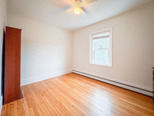 19 Center St, Weymouth, MA 02189 - spare room featuring a baseboard radiator, a ceiling fan, hardwood / wood-style floors, and ornamental molding
