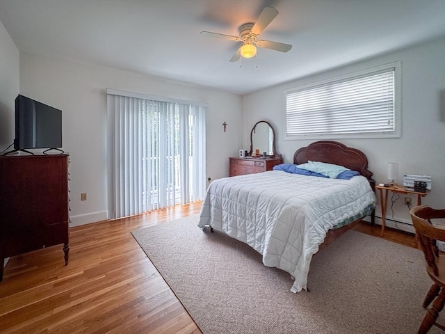 19 Center St, Weymouth, MA 02189 - bedroom featuring multiple windows, wood finished floors, and access to exterior