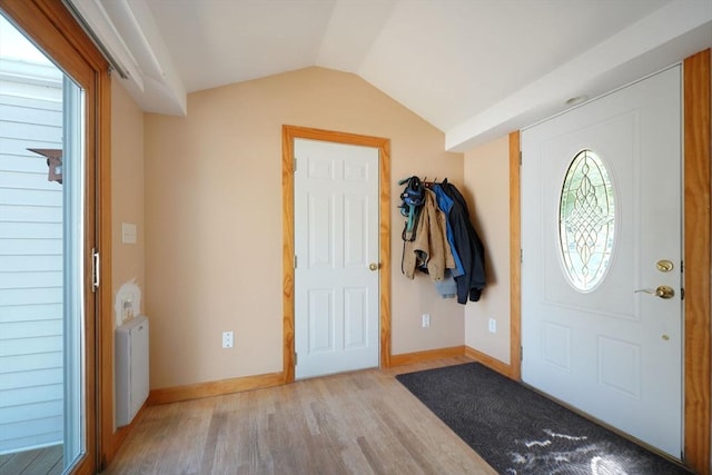 329 Brooklawn Ave, New Bedford, MA 02745 - foyer featuring light wood-style flooring, lofted ceiling, plenty of natural light, and baseboards