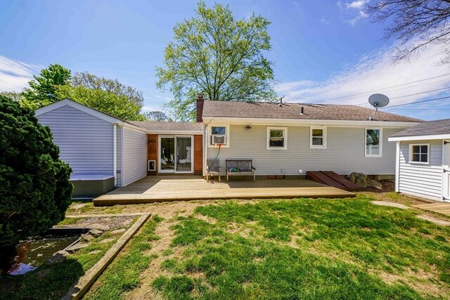 329 Brooklawn Ave, New Bedford, MA 02745 - rear view of property with a lawn, a chimney, and a deck