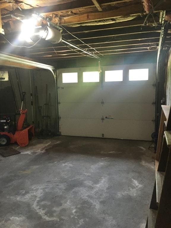 46 Mill Rd, Dudley, MA 01571 - garage featuring a garage door opener