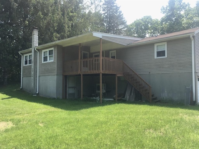 46 Mill Rd, Dudley, MA 01571 - back of house with a yard, stairway, a cooling unit, a chimney, and a deck