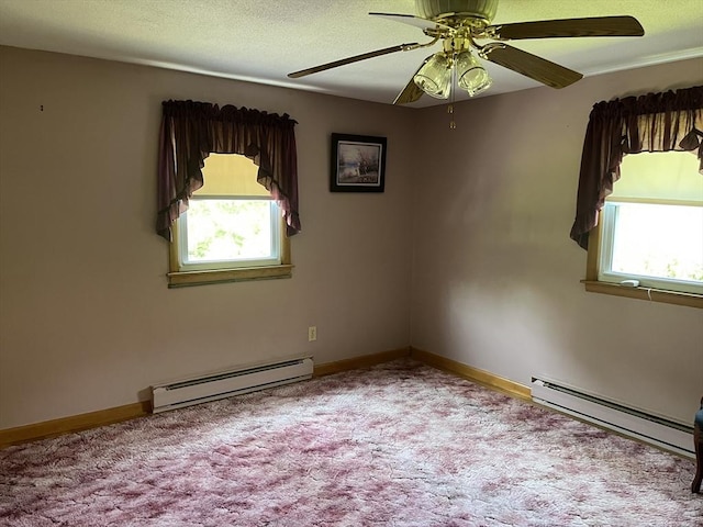 46 Mill Rd, Dudley, MA 01571 - carpeted empty room with a baseboard radiator, a baseboard heating unit, ceiling fan, and baseboards