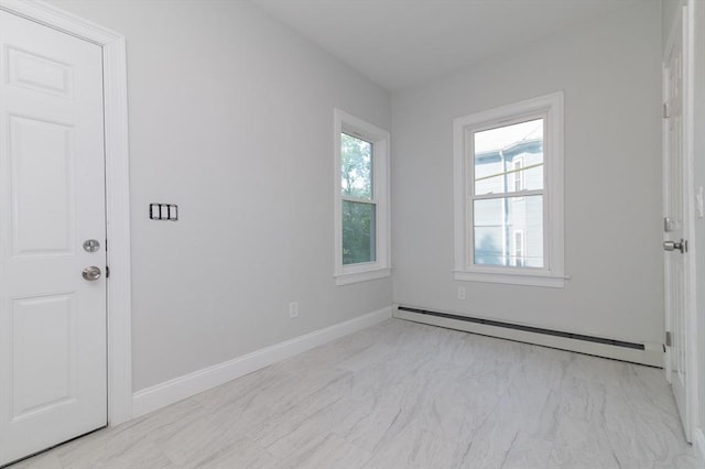 7 Cliff St, Attleboro, MA 02703 - empty room featuring a baseboard radiator and light marble finish flooring