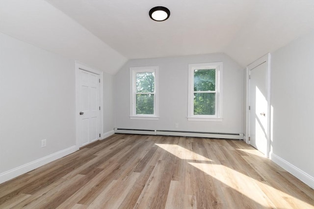 7 Cliff St, Attleboro, MA 02703 - bonus room featuring a baseboard radiator, vaulted ceiling, and wood finished floors