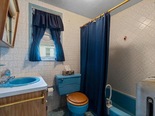 bathroom with toilet, vanity, shower / bath combo with shower curtain, and tasteful backsplash