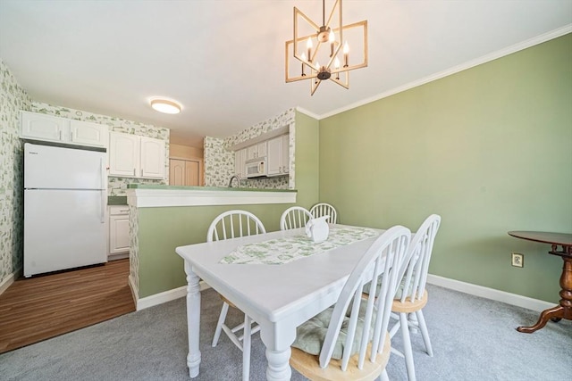 37 Hastings St Unit 207, Boston, MA 02132 - carpeted dining room with wallpapered walls, crown molding, and a chandelier