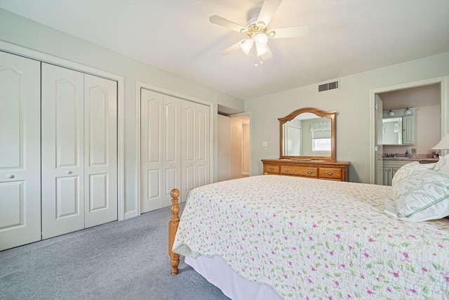 37 Hastings St Unit 207, Boston, MA 02132 - carpeted bedroom featuring two closets and ceiling fan