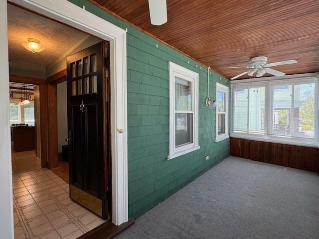 17 Olcott St, Watertown, MA 02472 - unfurnished sunroom with wooden ceiling